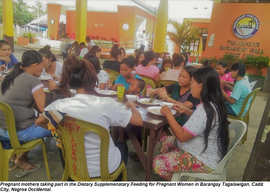 Pregnant mothers taking part in the Dietary Supplemenatary Feeding for Pregnant Women in Barangay Tagalawigan, Cadiz City, Negros Occidental