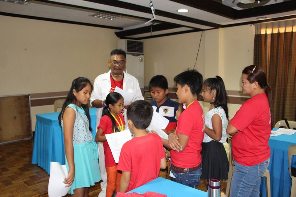 Mr. Ding Fugaban and Ms. Luningning Rhodes assist the BRSN Members for their recording.